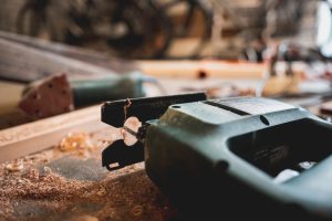 power tool leaning on wood
