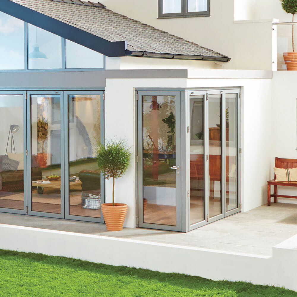 exterior shot of grey aluminium bifold door on modern home